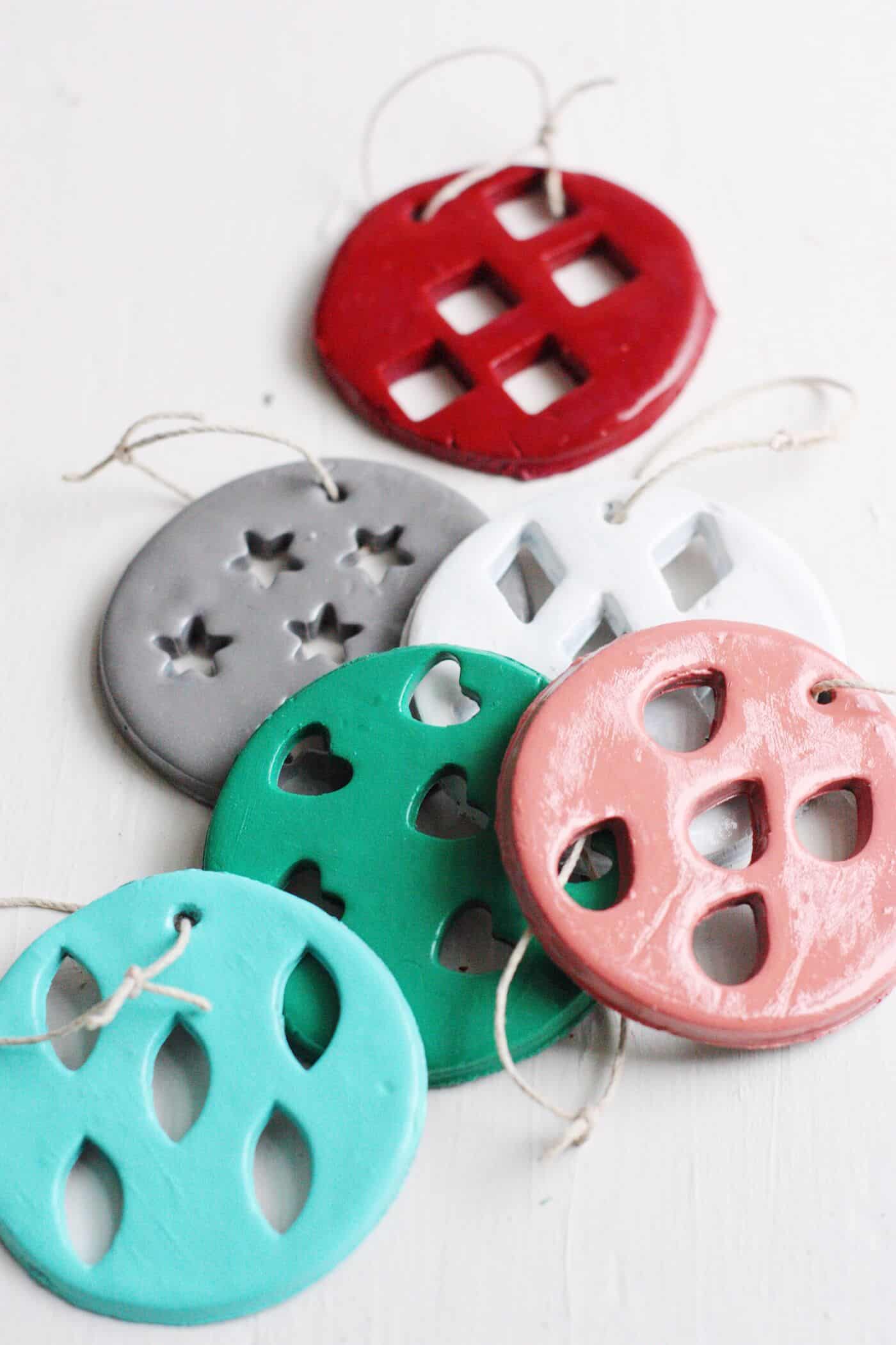 These clay Christmas ornaments are kid friendly but still look great on your tree! They are so easy to make; use your favorite paint colors.
