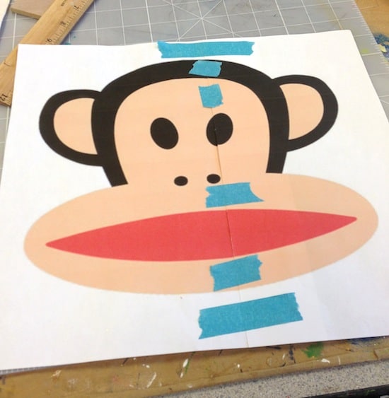 Paul Frank Julius monkey printed out on paper and taped together