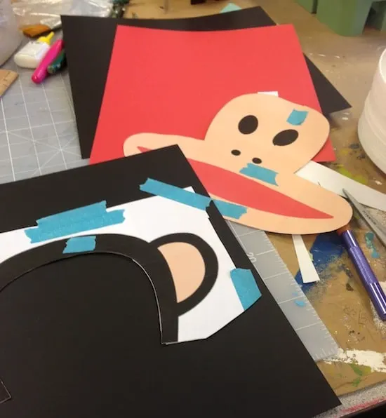 Black cardstock laid out on the work surface