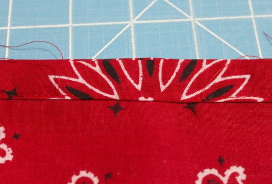 Sew the cut edge down