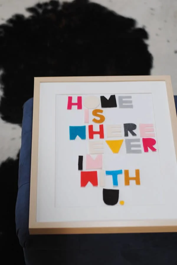 arranging felt letters in frame