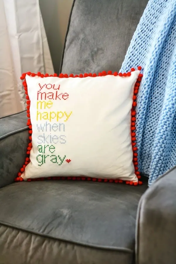 Make a DIY cross stitch pillow