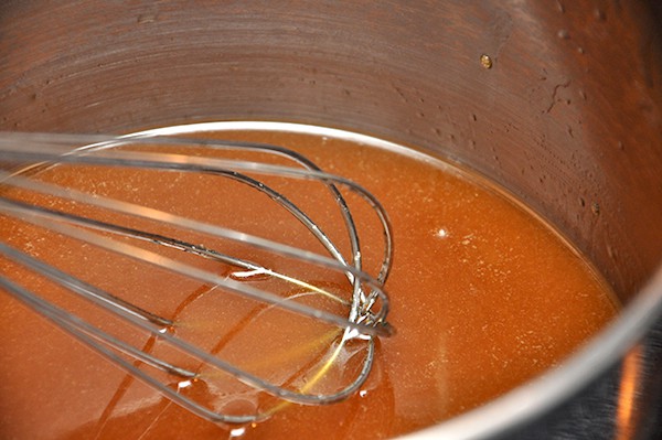 Whisking melted brown sugar and butter together