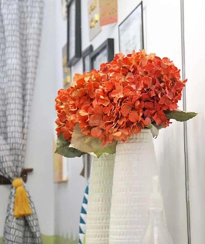 If you can't find fake flowers in the colors you need or just want a change, paint them! Here's how.