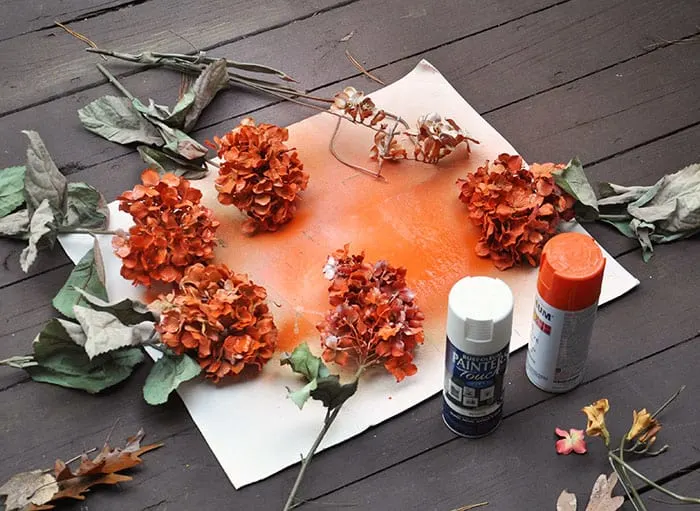 If you can't find fake flowers in the colors you need or just want a change, paint them! Here's how.
