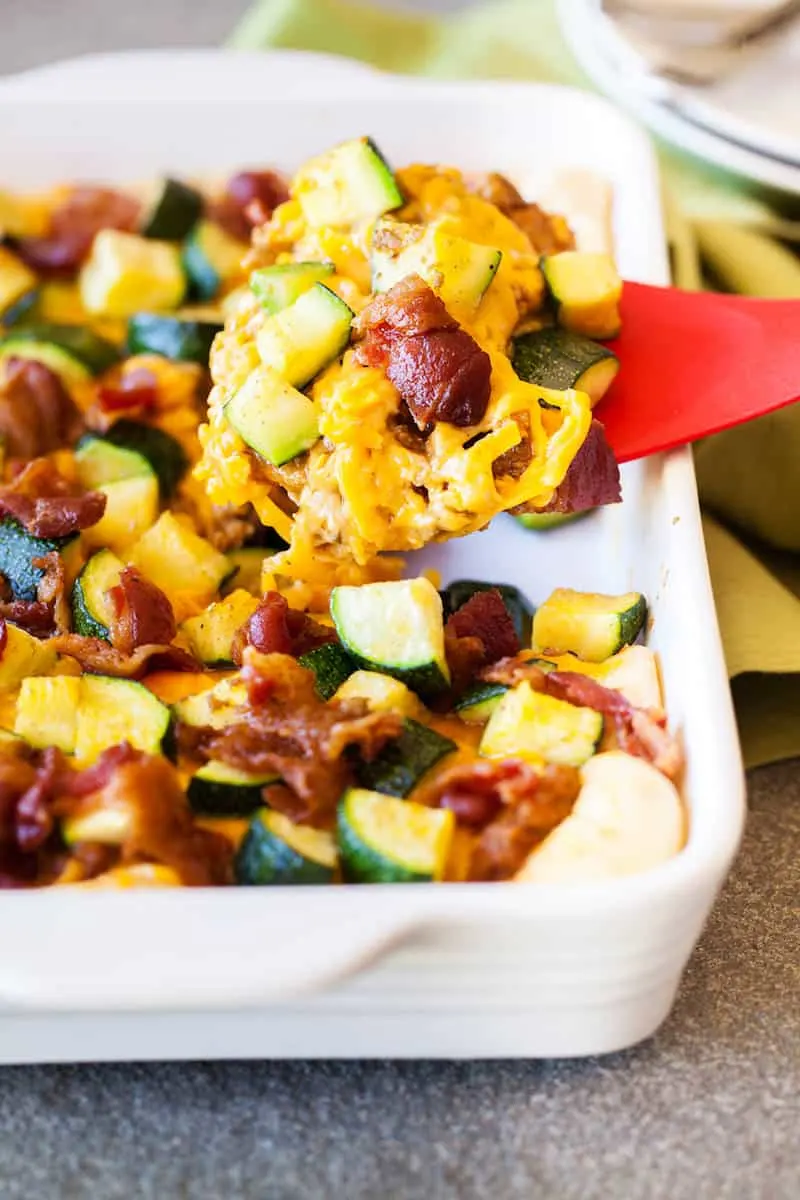 Ground turkey casserole with cheese on a spatula