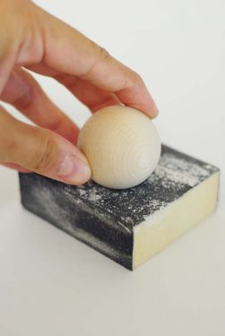 Wood ball on a sanding block