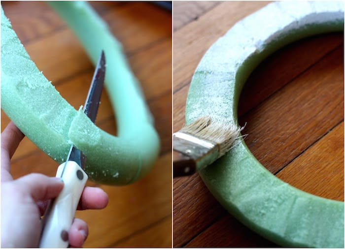 Cutting a wreath form with a knife to make it flat