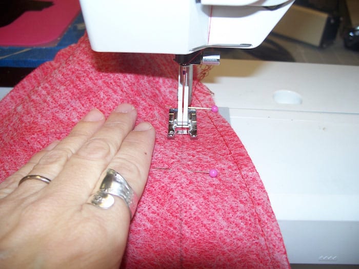 Sewing a Santa hat to make it smaller using a sewing machine