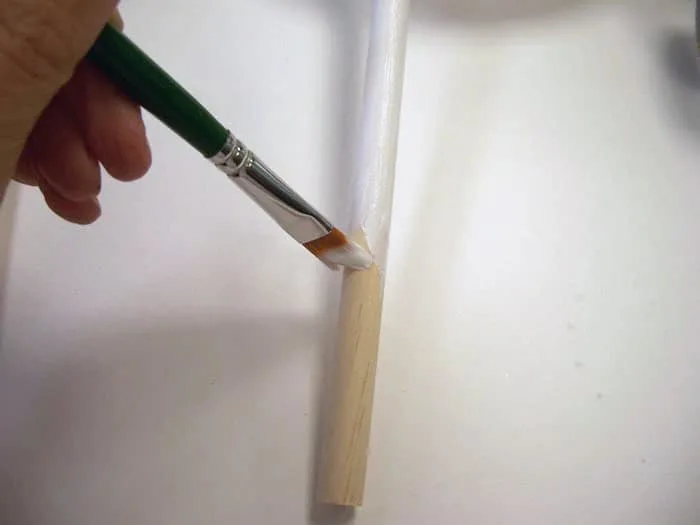Basecoating a dowel rod with white acrylic paint