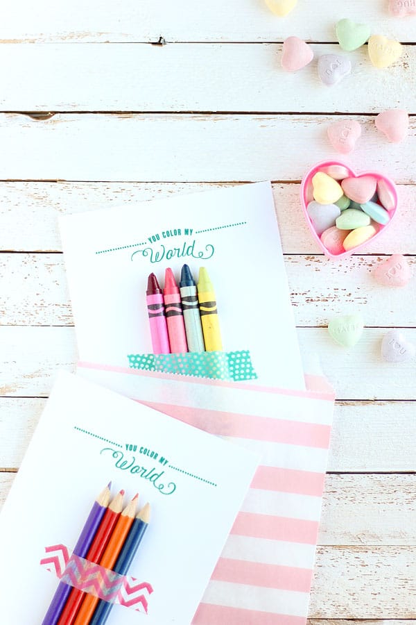 Use this cute free printable valentines card to give out in the classroom with a few crayons! Perfect non candy valentine idea!