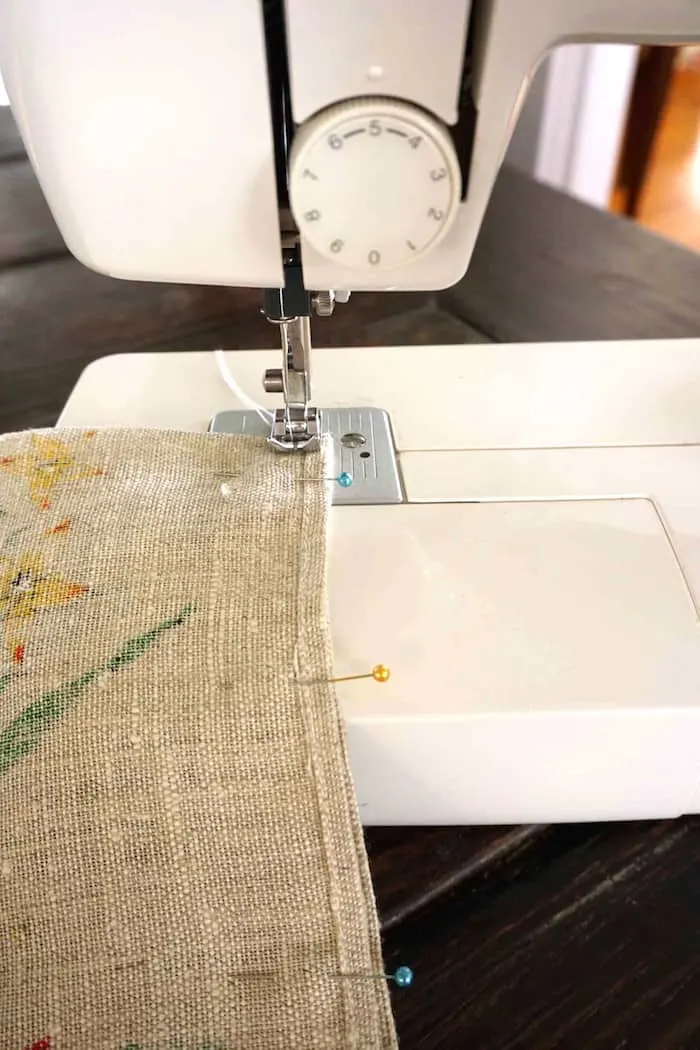 Sewing down the edge of a tea towel to make a tote