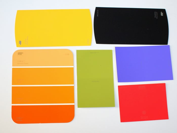Variety of paint chips laying on a work surface