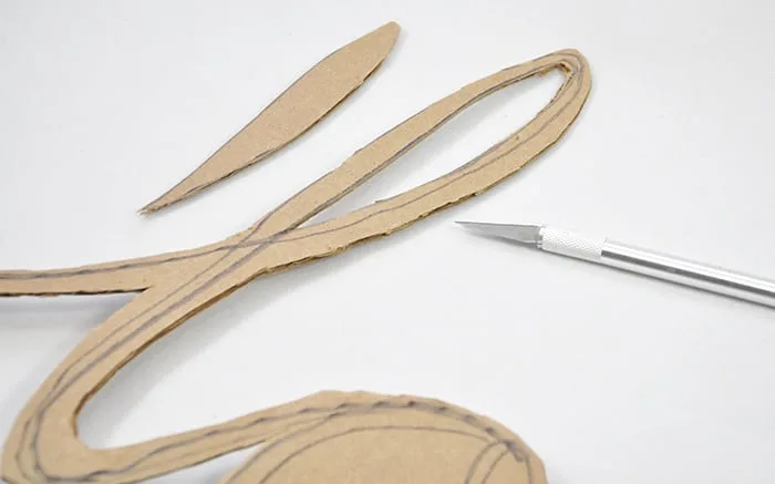 Cutting cardboard with a craft knife