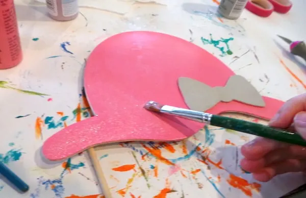 Painting a wooden woman's hat shape using Extreme glitter