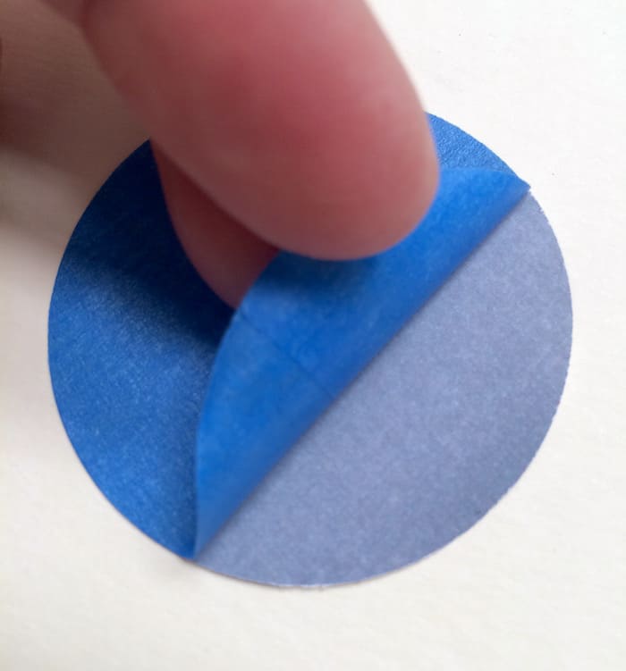 Peel the painter's tape circle off of the cardstock