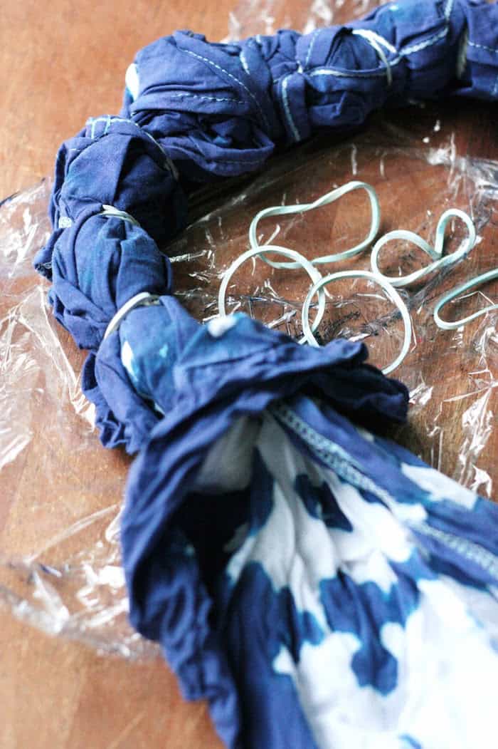 Removing the rubber bands from a tie dye project