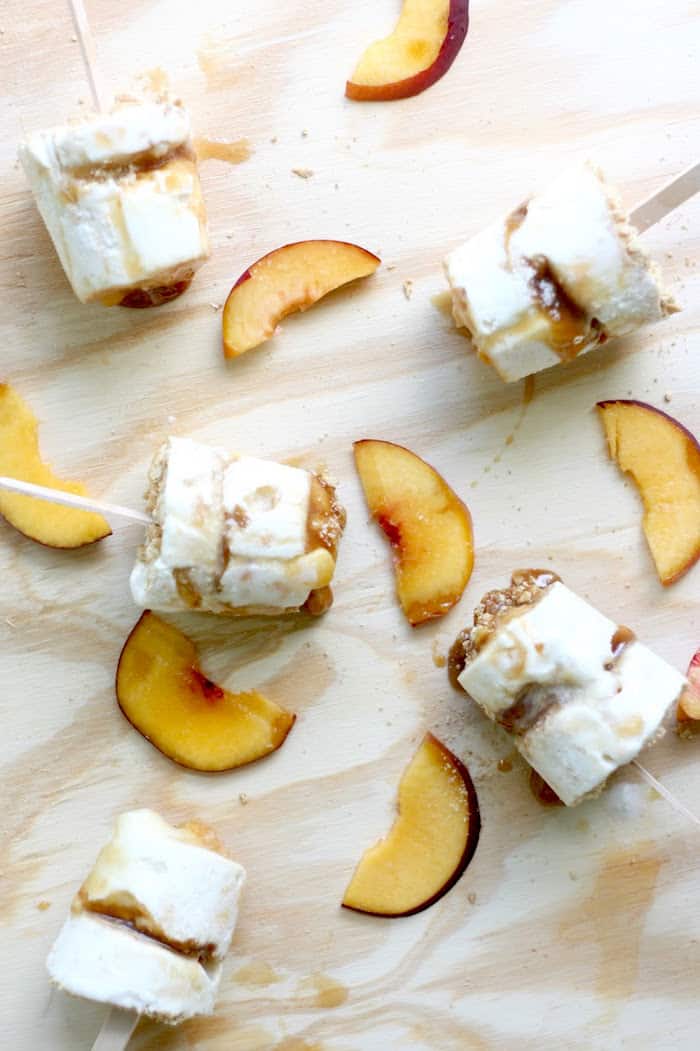 This popsicle recipe combines all the best parts of peach pie and ice cream with the deliciousness of rich honey caramel sauce. A perfect sweet treat!