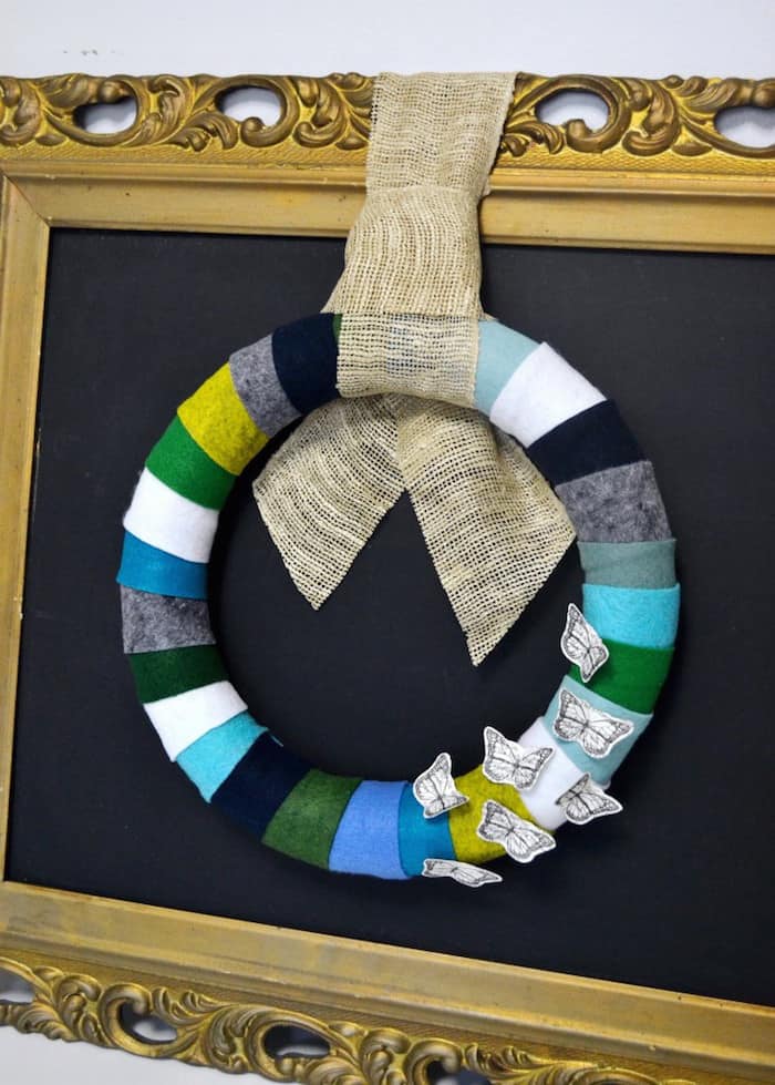 This felt DIY wreath is so versatile . . . choose any colors of felt that you'd like, and any embellishments that your heart desires!