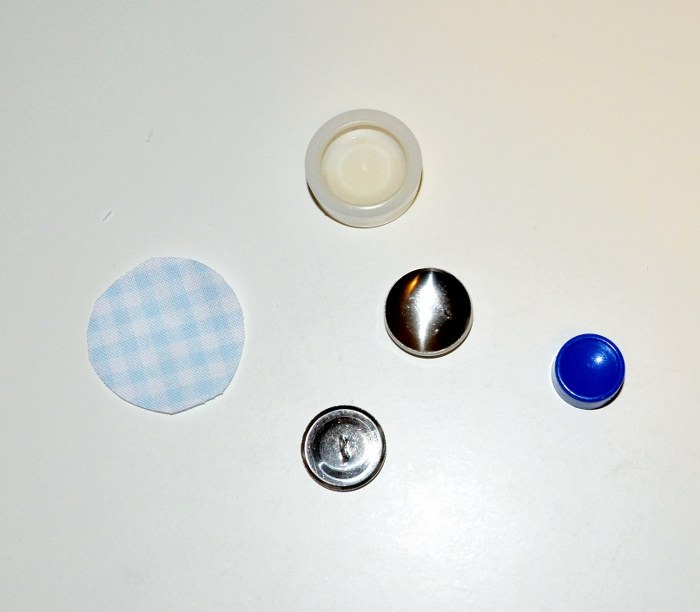 Fabric and covered button assembly