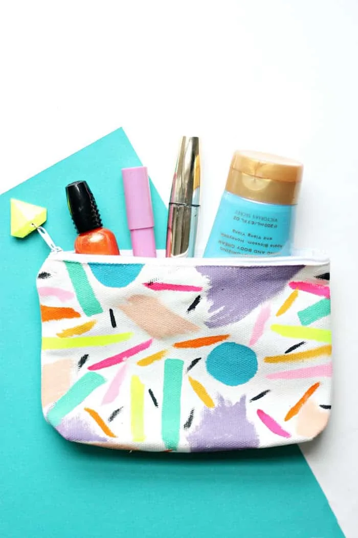 Painted pouch with accessories inside