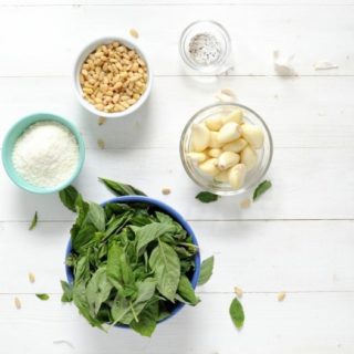 Classic Pesto Recipe Ingredients - pine nuts, garlic cloves, parmesan, basil