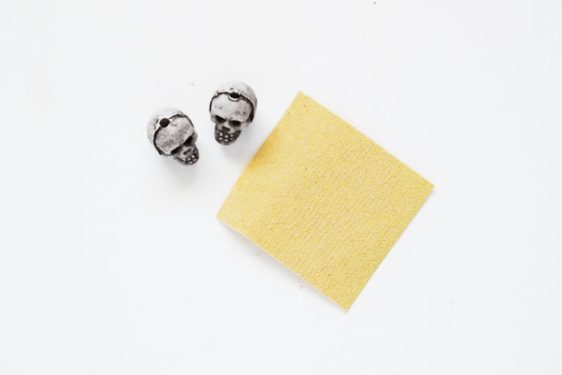 Sanding the beads with sandpaper
