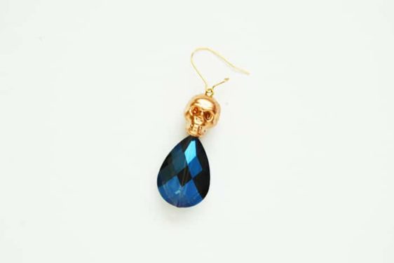 Single completed skull earring