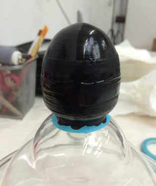 Apothecary jar handle painted in black