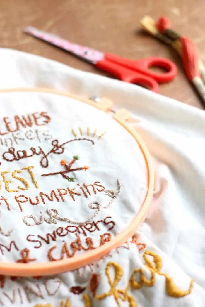 This pretty DIY wall hanging is embroidered with a fun fall theme! Our has a rustic touch but you can customize yours any way you like.