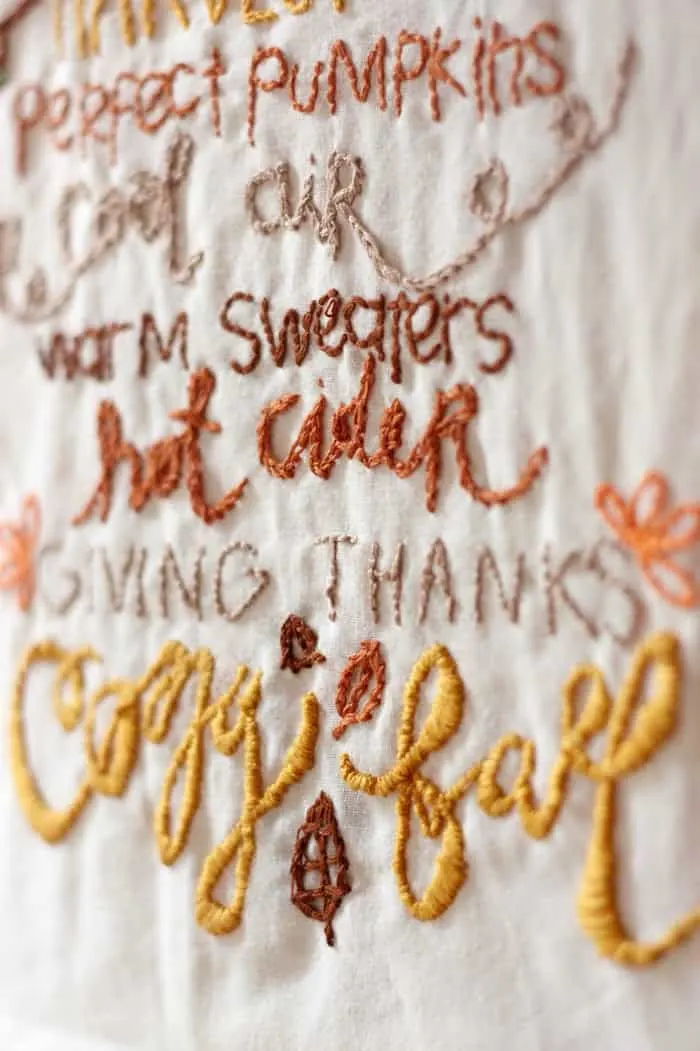 This pretty DIY wall hanging is embroidered with a fun fall theme! Our has a rustic touch but you can customize yours any way you like.