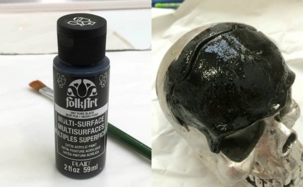 Painting skull with black paint