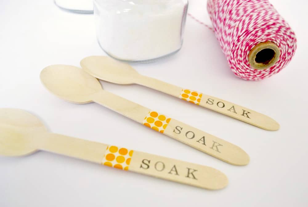 Wooden spoons with washi tape and letters stamped SOAK