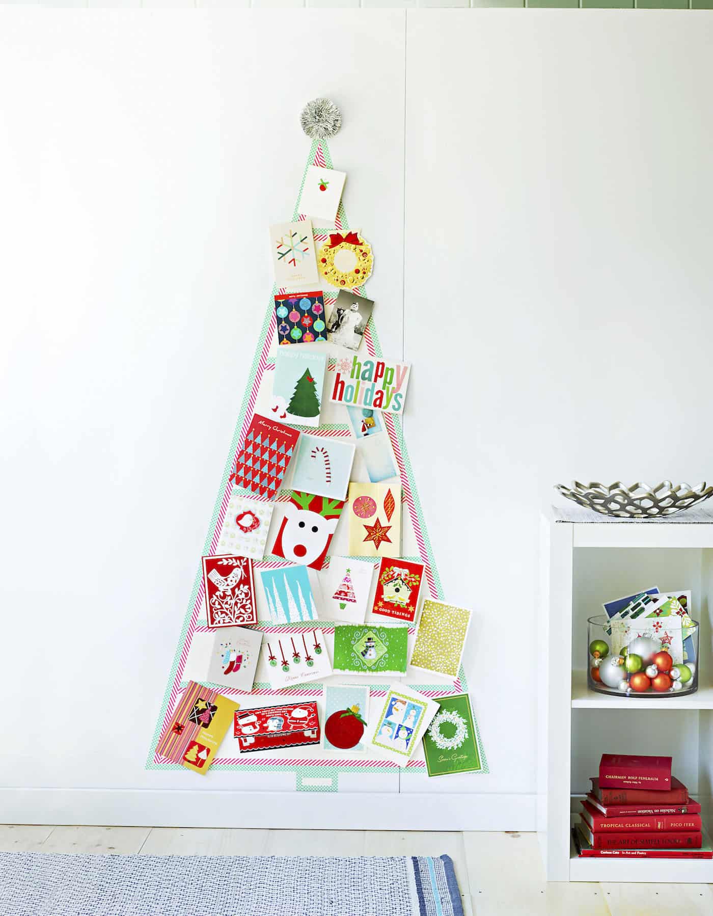 This DIY washi tape tree is a no-fuss way to display the holiday cards that arrive in your mailbox each day! It comes right off the wall when you're done.