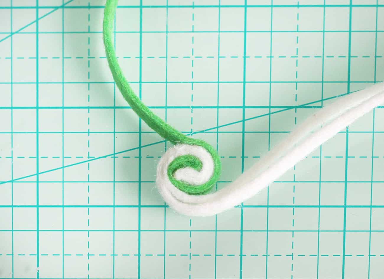 Rolling felt to create a peppermint pattern