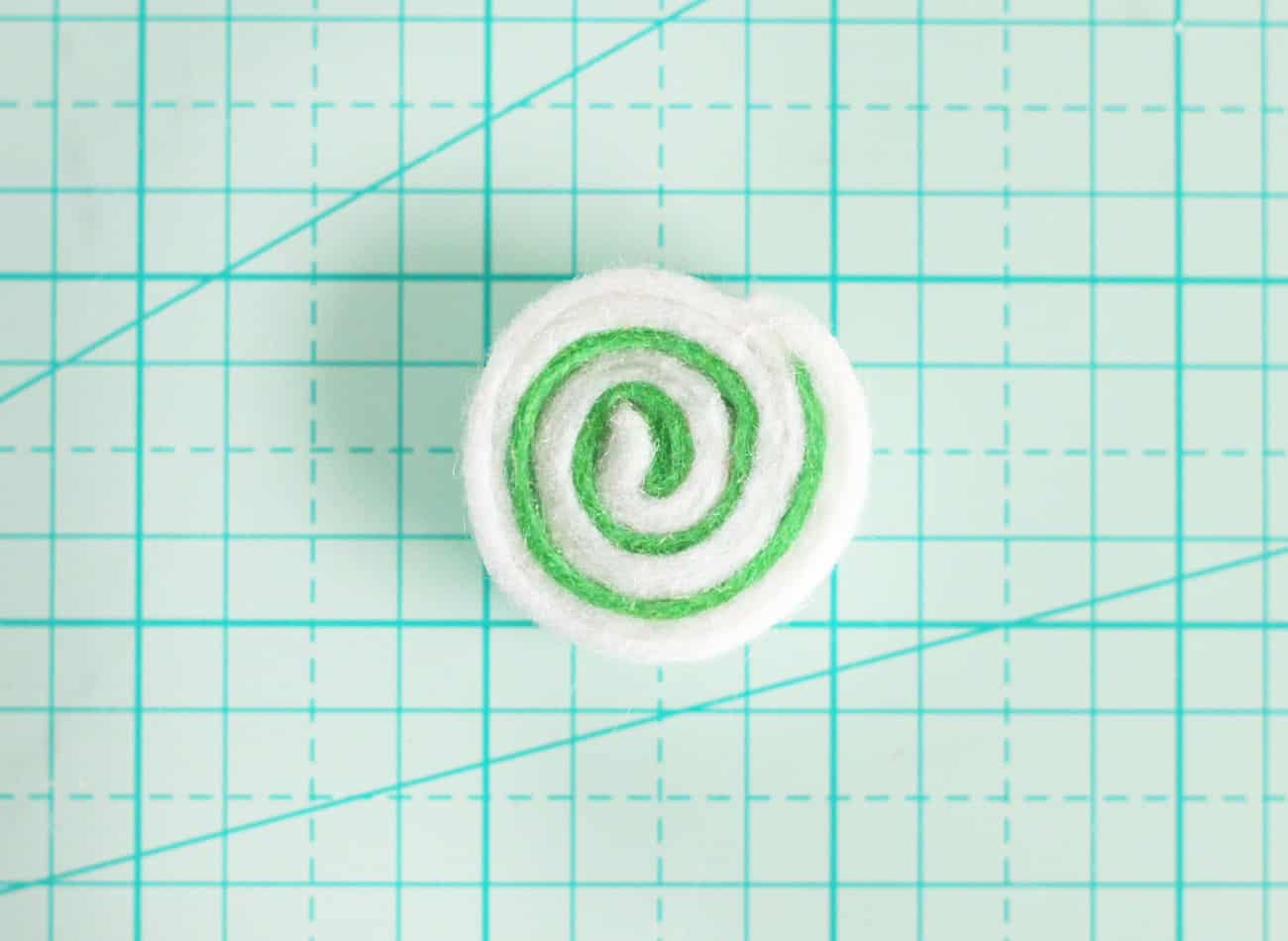 Peppermint shape created out of white and green felt