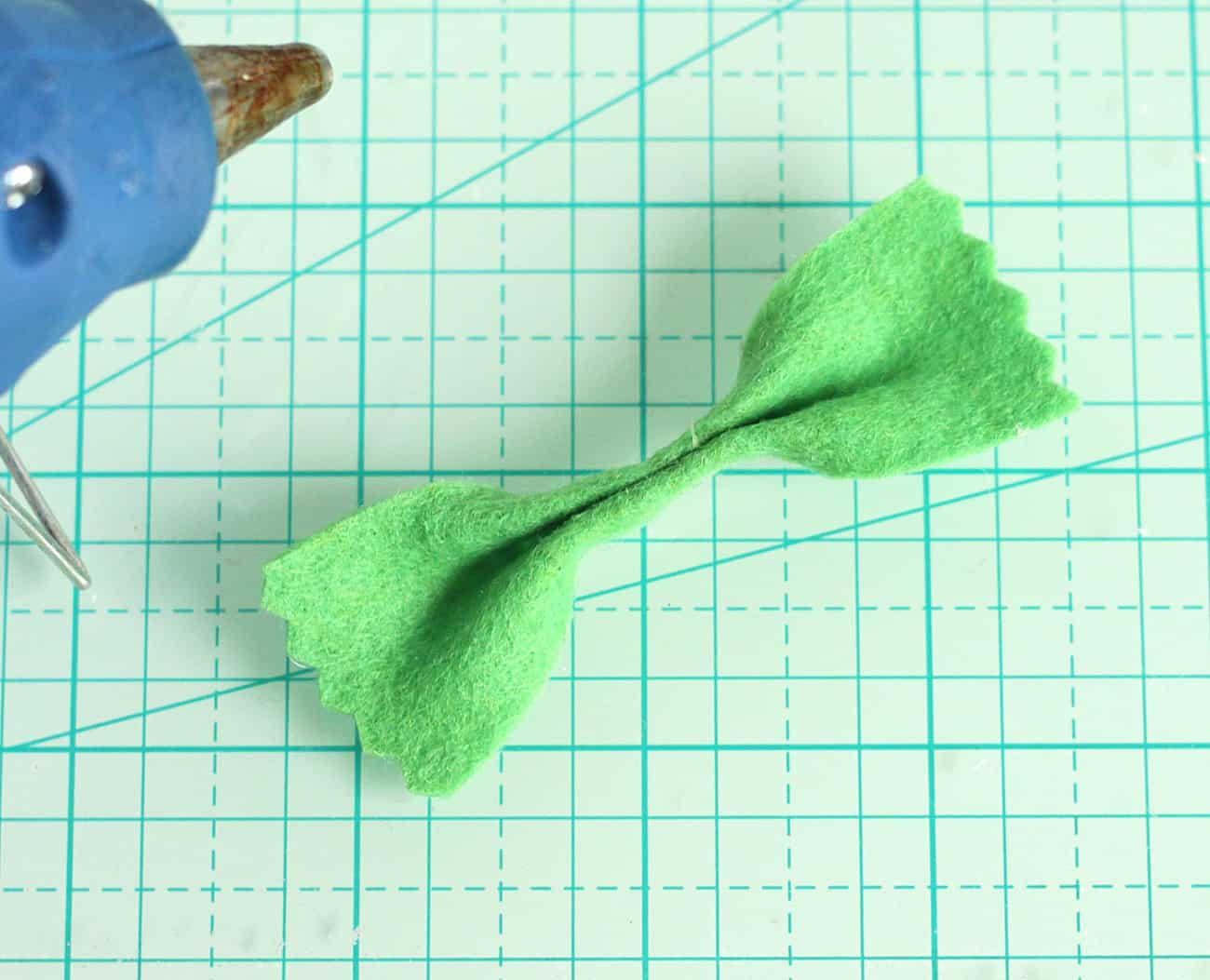 Rectangular piece of felt hot glued in the center