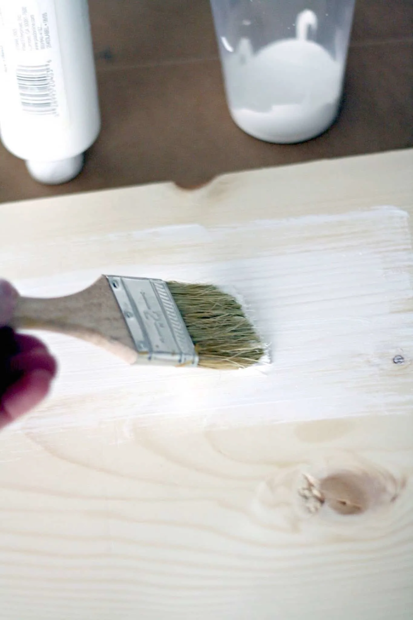 Painting a board with white craft paint