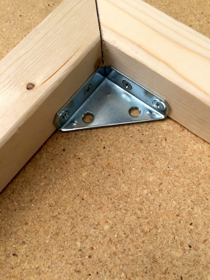 Part of a table with a brace in the corner