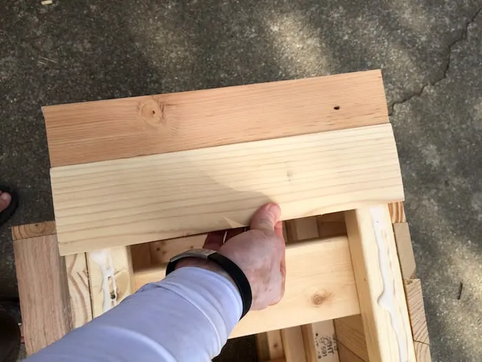 Adding the sides of the coffee table with craft glue