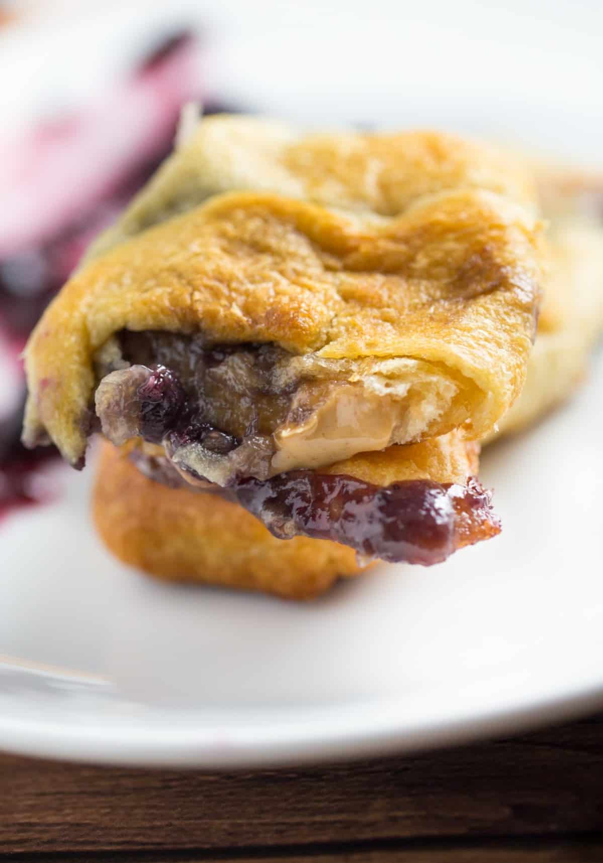 This jelly roll recipe includes an upgrade over the standard PB&J sandwich - you use crescent rolls as a buttery, flakey replacement for regular bread.