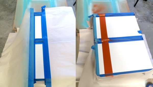 Spray painting a stripe on the front of a cabinet