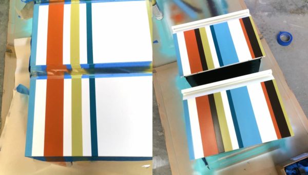 stripes spray painted on the front of a file cabinet