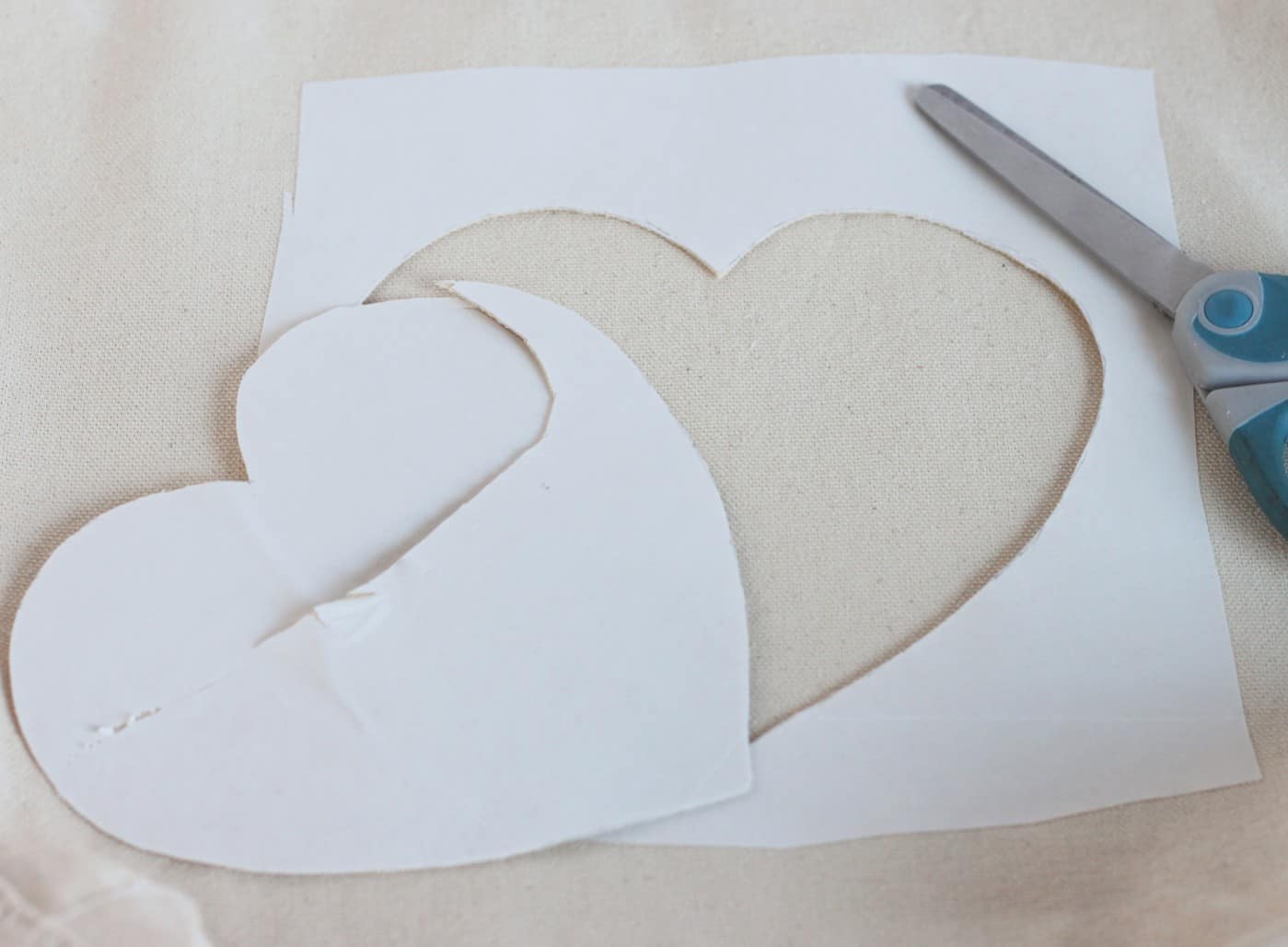 Inside of the heart cut out with the scissors from the tote bag