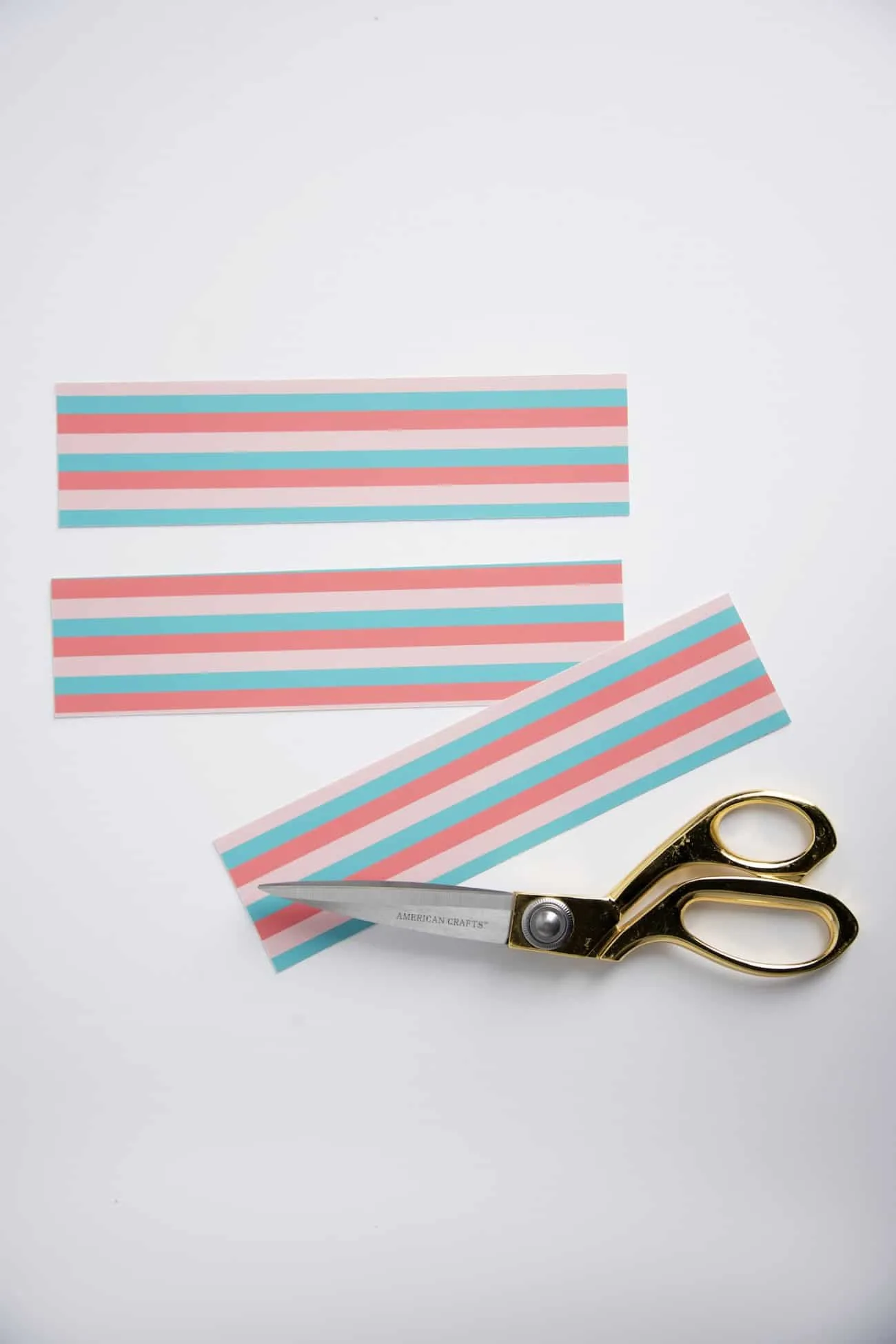 Cutting out the cupcake wrappers out of paper