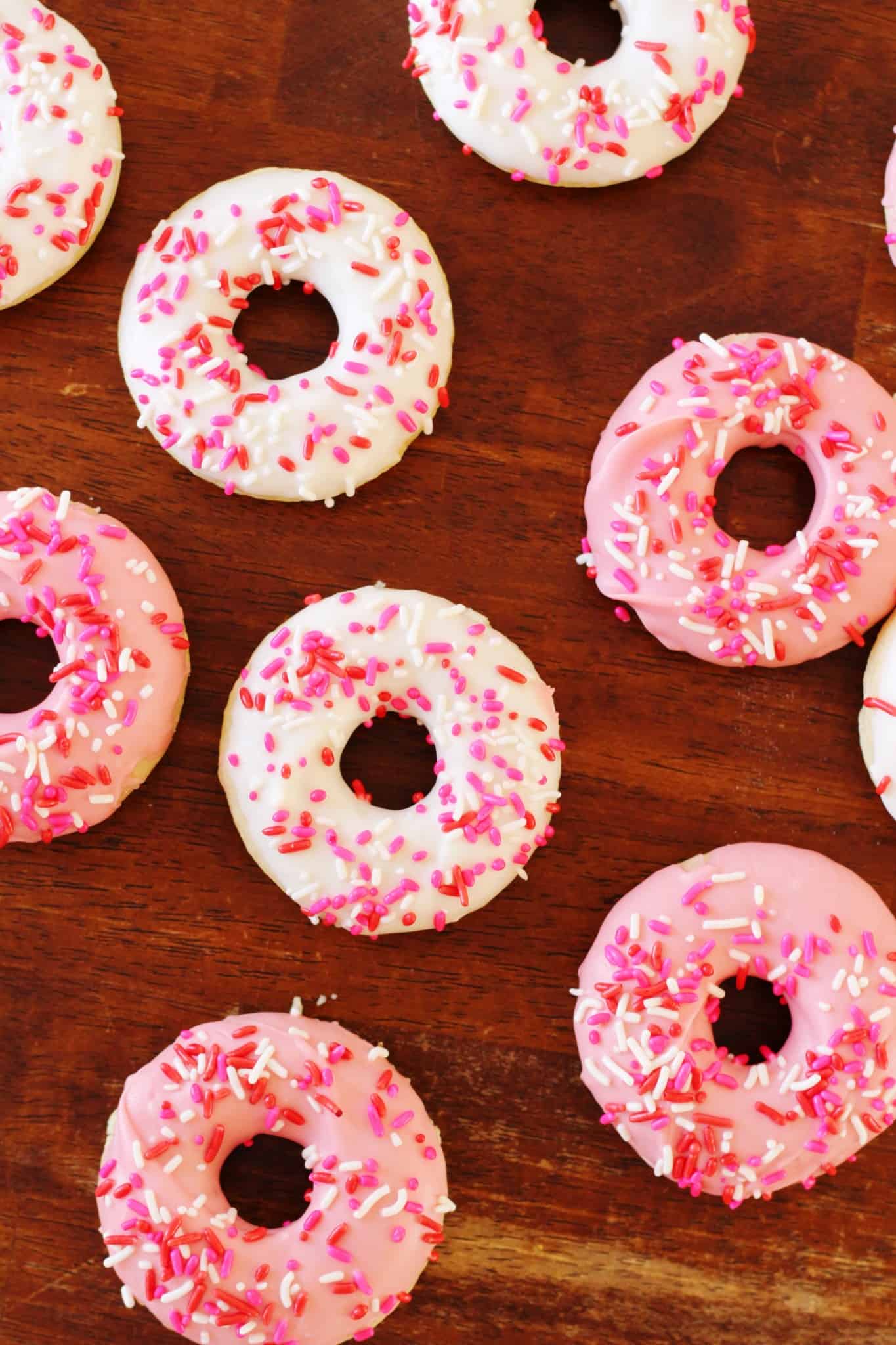 This delicious donuts recipe uses candy melts instead of frosting for the ultimate sweetness. Add Valentine's Day sprinkles or customize for any holiday!