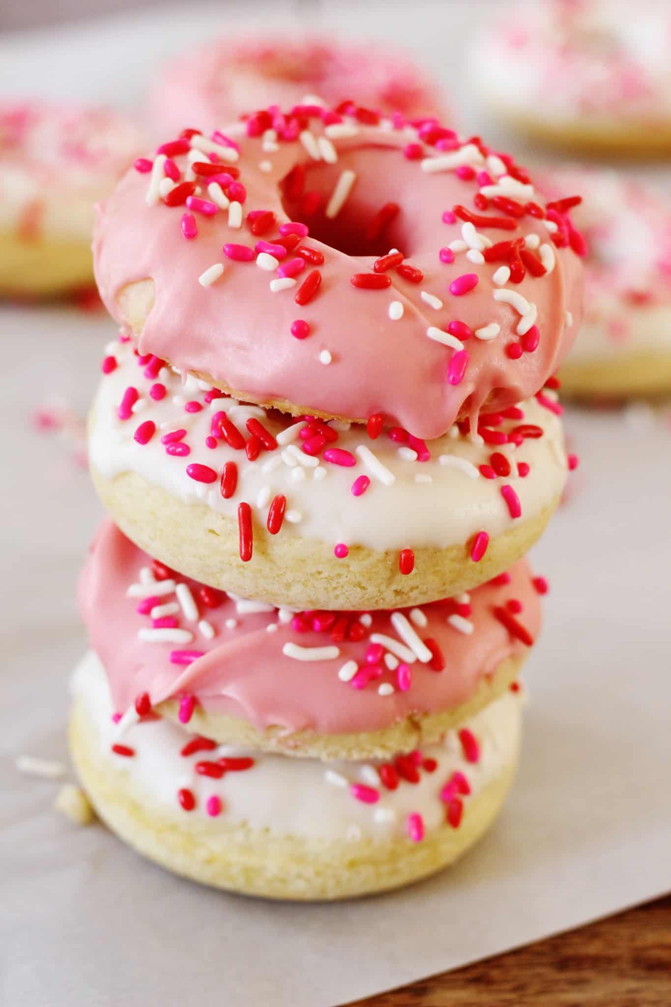 This delicious donuts recipe uses candy melts instead of frosting for the ultimate sweetness. Add Valentine's Day sprinkles or customize for any holiday!