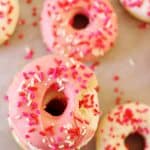 This delicious donuts recipe uses candy melts instead of frosting for the ultimate sweetness. Add Valentine's Day sprinkles or customize for any holiday!