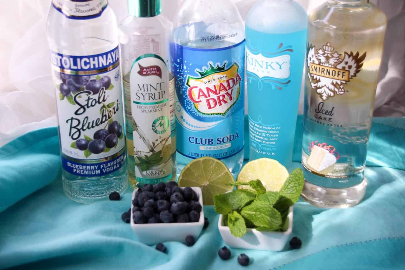Stoli Blueberi vodka, mint syrup, Canada Dry club soda, Smirnoff iced cake vodka, Kinky blue