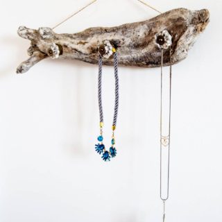 Use a gorgeous driftwood piece to create a unique jewelry hanger. It looks great on the wall whether you have jewelry on it or not, and it's easy to make!